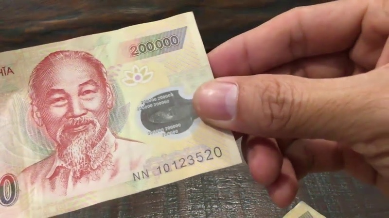 Ý nghĩa mơ thấy giữ tiền 200 nghìn